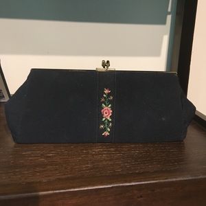Vintage black clutch with floral detailing